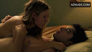 He pushes her hard into the mattress