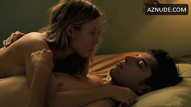 He pushes her hard into the mattress
