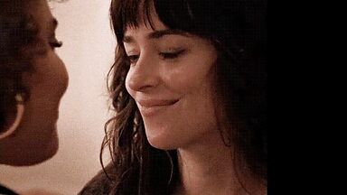 Short kiss between the two brunettes