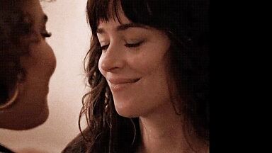 Short kiss between the two brunettes