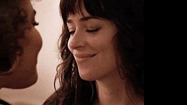 Short kiss between the two brunettes