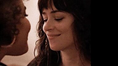 Short kiss between the two brunettes