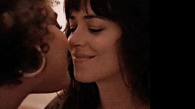 Short kiss between the two brunettes