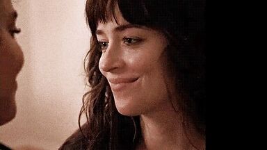 Short kiss between the two brunettes