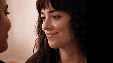 Short kiss between the two brunettes