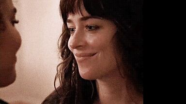Short kiss between the two brunettes