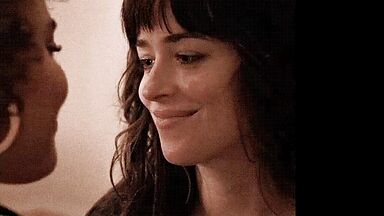 Short kiss between the two brunettes