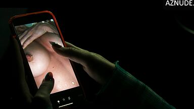 Pervert has pictures of her bare breasts on her phone