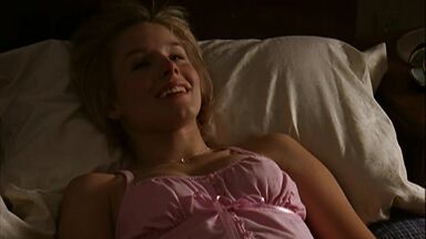 In underwear and in the shower is Kristen Bell