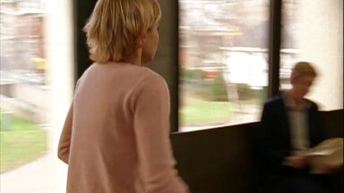 In underwear and in the shower is Kristen Bell