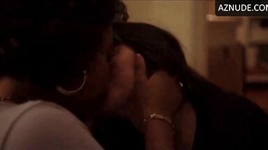 Kisses between a black woman and a white woman