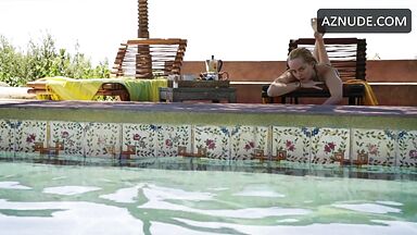 She in a swimsuit in the pool