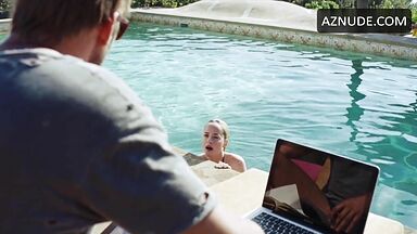 She in a swimsuit in the pool