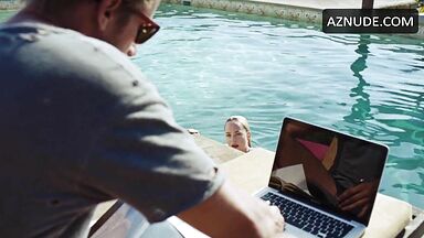 She in a swimsuit in the pool