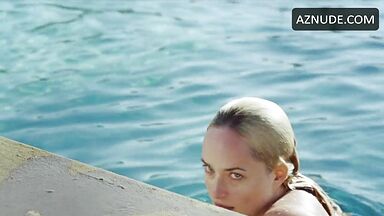 She in a swimsuit in the pool