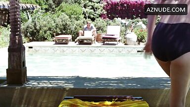 She in a swimsuit in the pool
