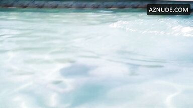 She in a swimsuit in the pool