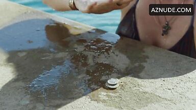 She in a swimsuit in the pool