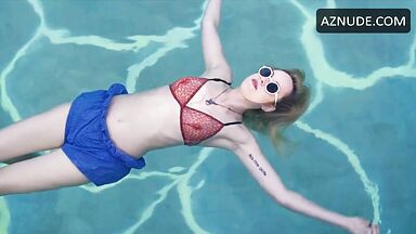 Dakota is floating in the pool