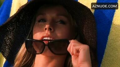 In a bikini on a sun lounger