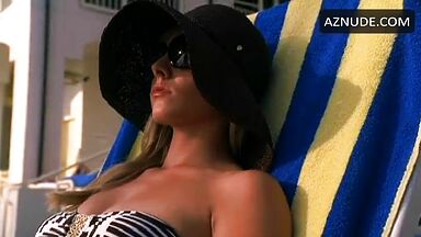 In a bikini on a sun lounger