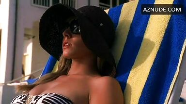 In a bikini on a sun lounger