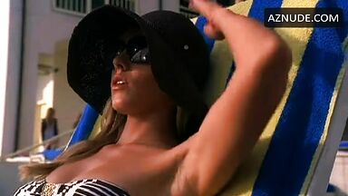 In a bikini on a sun lounger