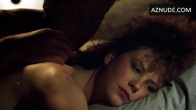 Sex in bed with a girl with curly hair