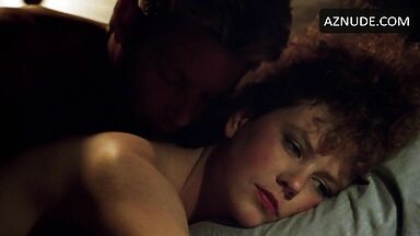 Sex in bed with a girl with curly hair