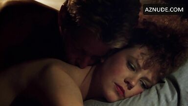 Sex in bed with a girl with curly hair
