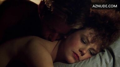 Sex in bed with a girl with curly hair