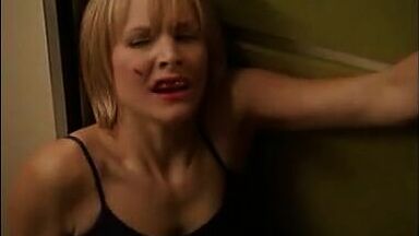 Kristen Bell with a bleeding lip and in pajamas