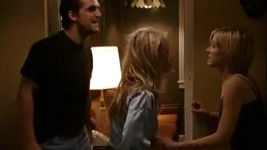 Kristen Bell with a bleeding lip and in pajamas