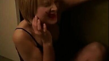 Kristen Bell with a bleeding lip and in pajamas