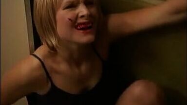 Kristen Bell with a bleeding lip and in pajamas