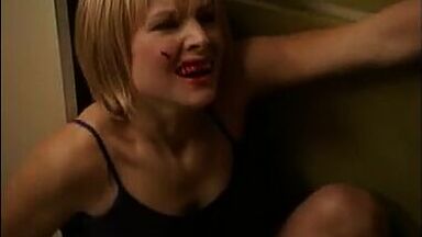 Kristen Bell with a bleeding lip and in pajamas