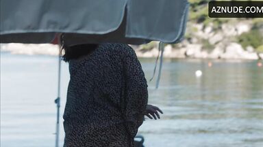 Sexy mommy comes out of the sea
