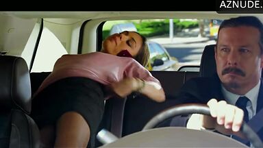 She undresses in the back seat