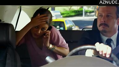She undresses in the back seat