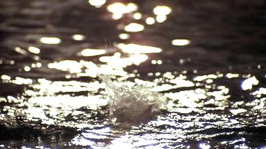 She jumps into the water naked