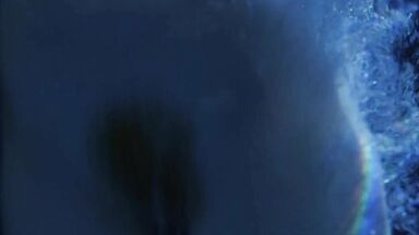 She jumps into the water naked