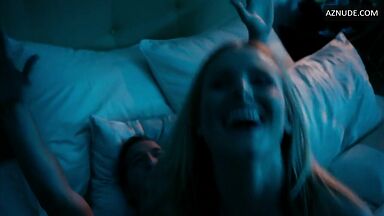Sex in bed with her hand in his mouth