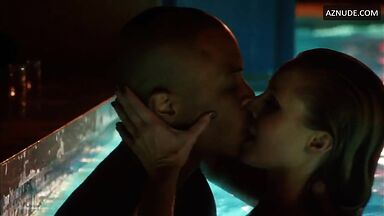 Sex in bed with her hand in his mouth