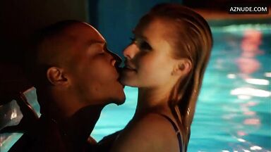 Sex in bed with her hand in his mouth