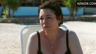 Wet in a swimsuit on a sun lounger