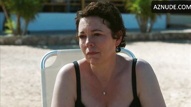 Wet in a swimsuit on a sun lounger