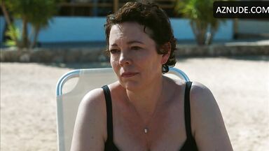 Wet in a swimsuit on a sun lounger