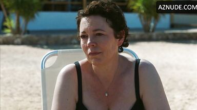 Wet in a swimsuit on a sun lounger