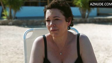 Wet in a swimsuit on a sun lounger