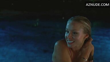 She comes out of the pool in a swimsuit